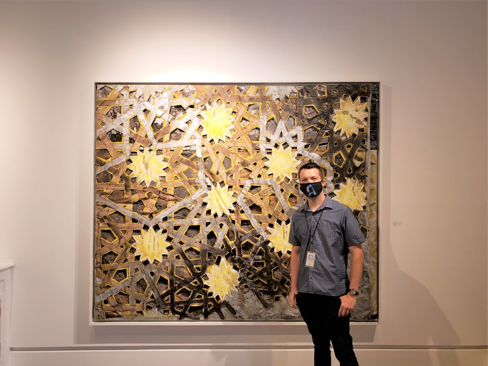 Willard Johnson in front of his painting "The Tide"